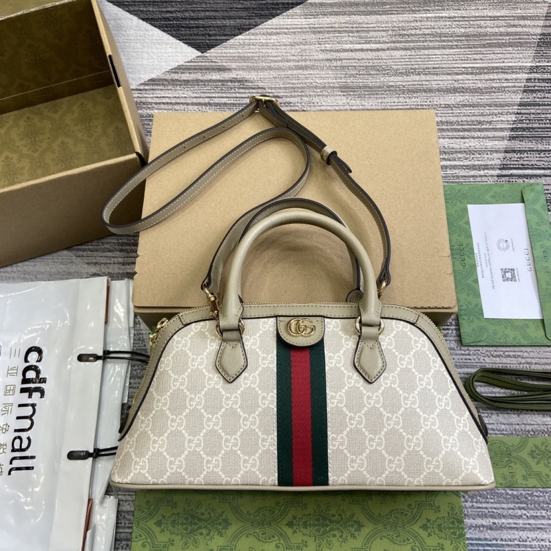 G*u*i top handle bags